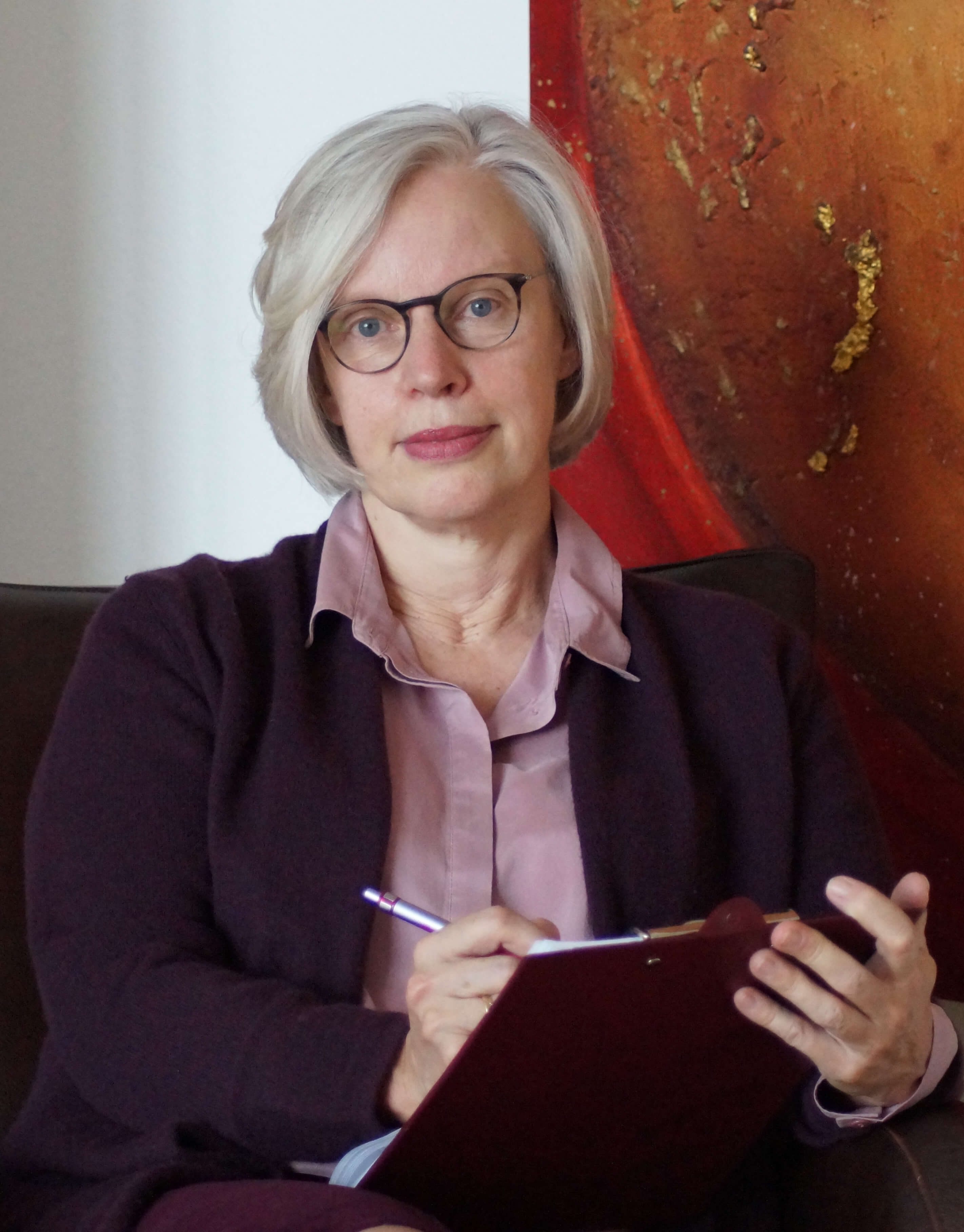 Dr. Susanne Schütte in a chair
